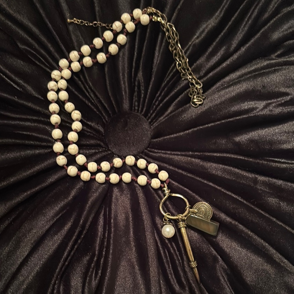Elegant Beaded Necklace with Charms